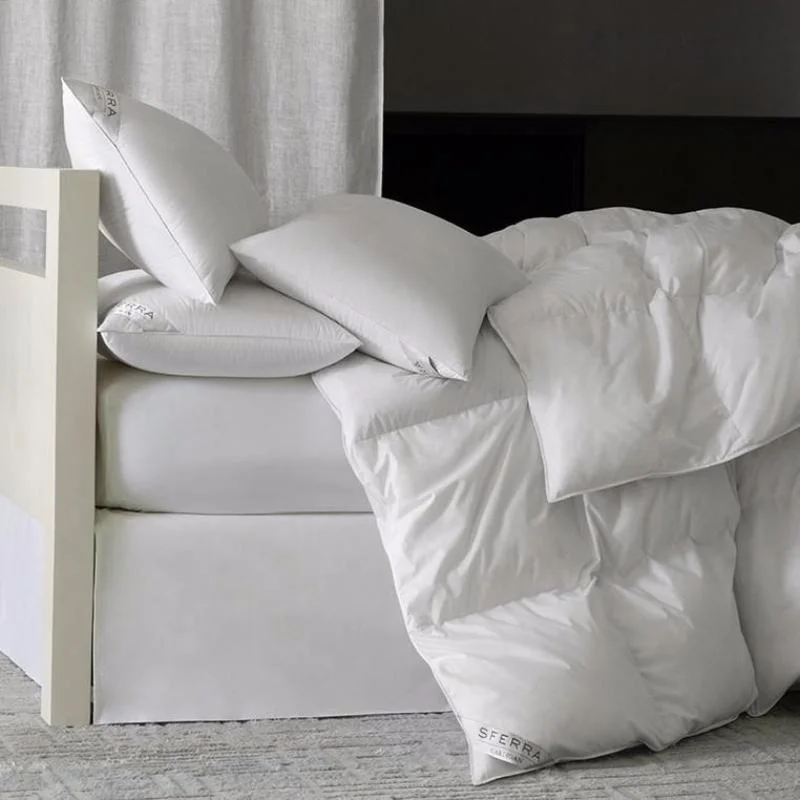 Synthetic - filled comforters like polyester for affordability and hypoallergenic propertiesCardigan Down Comforters by Sferra