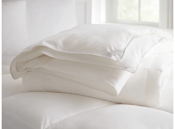 Down - filled comforters for supreme warmth and lightnessDown Alternative Duvet by Peacock Alley Down - filled comforters for supreme warmth and lightnessDown Alternative Duvet by Peacock Alley