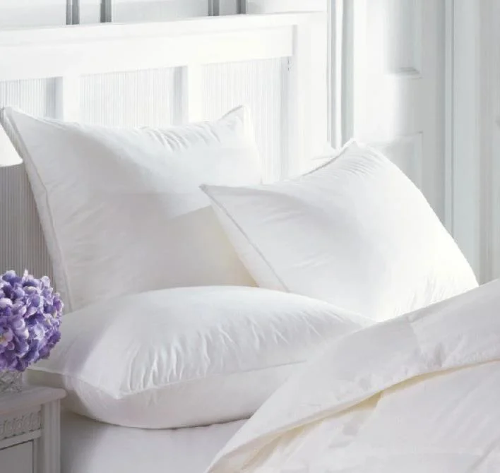 Latex - filled comforters with a bouncy texture and good supportIntera Firmasoft White Goose Down Pillow by Downright