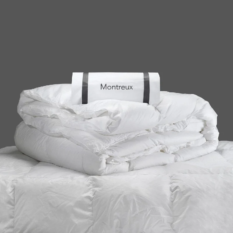 Goose down comforters known for their superior quality and insulationMontreux Down Comforter by Matouk Goose down comforters known for their superior quality and insulationMontreux Down Comforter by Matouk