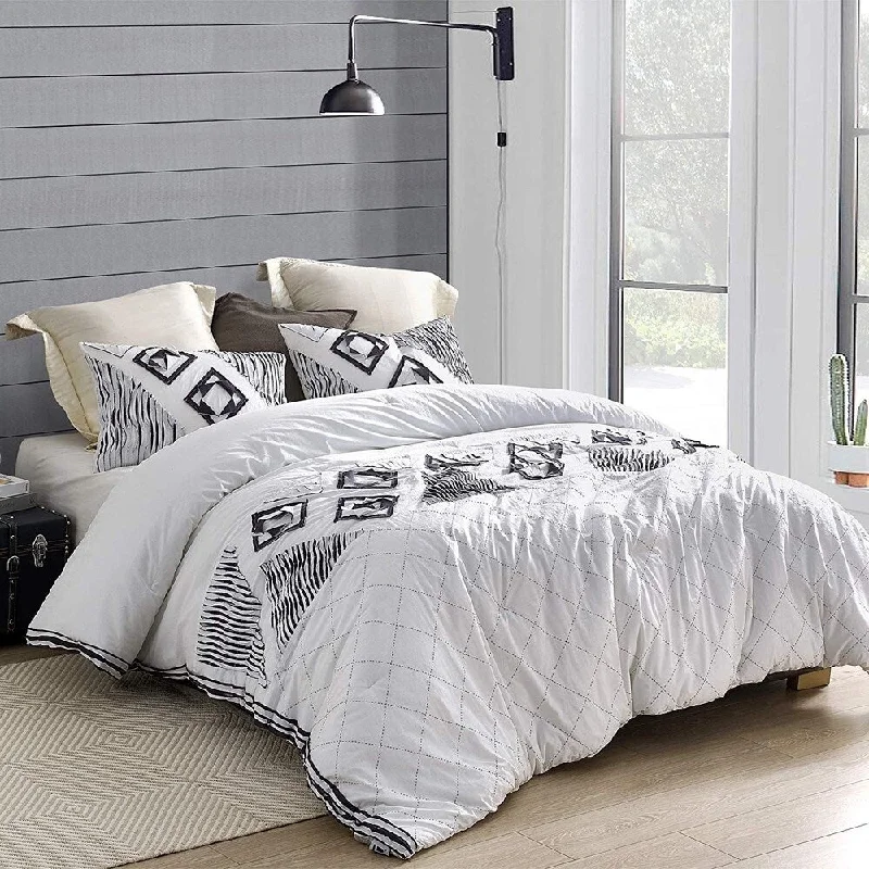 Duck down comforters with a softer feel and good warmth retentionNavy Blowout Textured Oversized Comforter - White/Navy