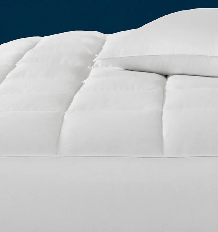 Wool - filled comforters with natural moisture - wicking and temperature - regulating featuresMonmouth Mattress Pad by Sferra Wool - filled comforters with natural moisture - wicking and temperature - regulating featuresMonmouth Mattress Pad by Sferra