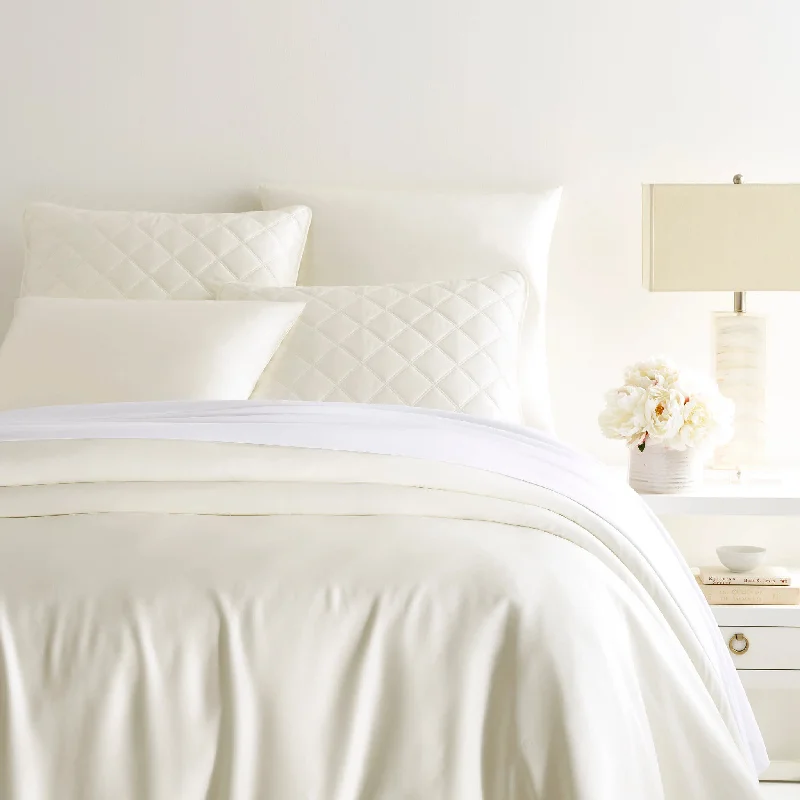 Oversized duvet covers that drape beautifully over the sides of the bed for a luxurious lookSilken Solid Ivory Duvet Cover Oversized duvet covers that drape beautifully over the sides of the bed for a luxurious lookSilken Solid Ivory Duvet Cover