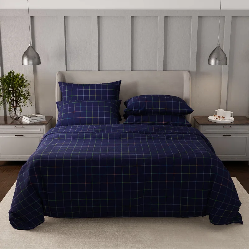 Goose down comforters known for their superior quality and insulationIndigo Rainbow Chèques Goose down comforters known for their superior quality and insulationIndigo Rainbow Chèques